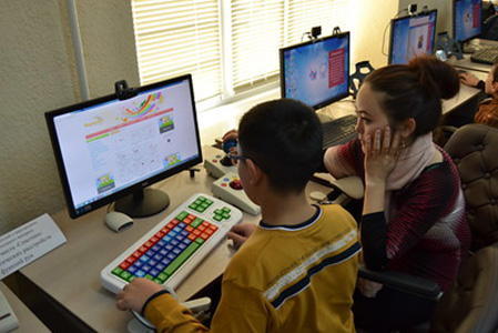 boy with adaptive keyboard